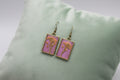 Pressed Pink Flower Resin Earrings – Magenta Background